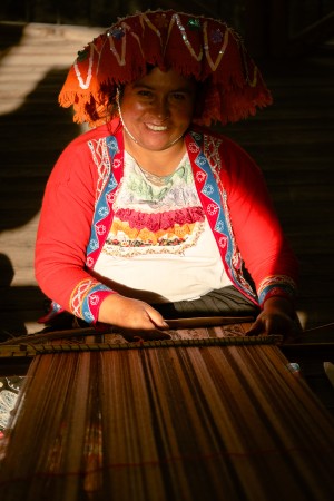 ViContrast portrait photography of peruvian woman weaving a scarf